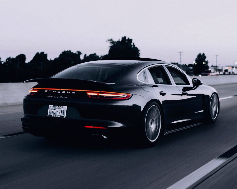 Sports car in motion, flash done fast